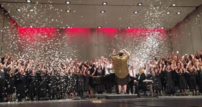 The choir sets off their confetti cannons during one of their final songs.