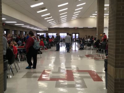 The stage was set to honor the scholar students in the high school cafeteria.