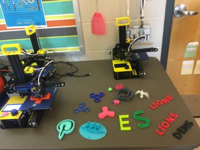 A few 3D printed fidgeters, along with other 3D printed objects made by EAST students. 