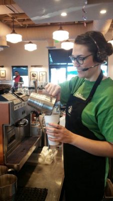 Rachel Treadwell prepares coffee drink for customer